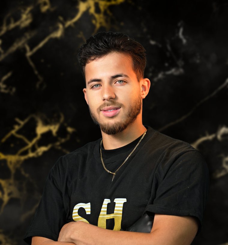 Chiky, barber at SH Barbershop