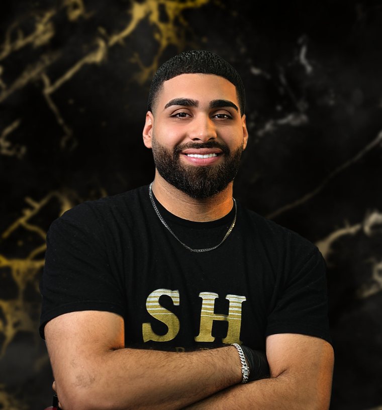 Houbi, founder and master barber at SH Barbershop