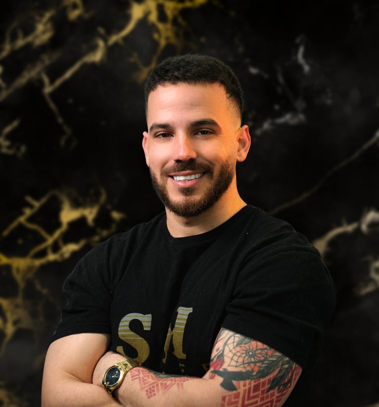 Mario, barber at SH Barbershop