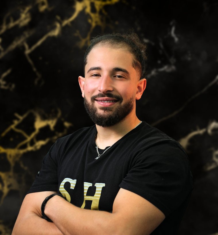 Naji, barber at SH Barbershop